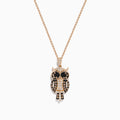 The Safari 14K Rose Gold Owl Pendant features 0.58 TCW brown, black, and white diamonds highlighting its eyes, wings, and body, all hanging from a delicate chain.