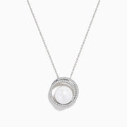The 14K White Gold Fresh Water Pearl and Diamond Pendant features a round pendant with a central freshwater pearl, surrounded by sparkling diamonds, hanging from a fine white gold chain for an elegant look.