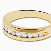 The Mens 14K Yellow Gold 9-Stone Channel Set Diamond Band, 0.50 TCW, features a row of round white diamonds channel set across the top and is displayed on a plain white background.