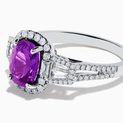 The Effy Hematian 18K White Gold Purple Sapphire and Diamond Ring showcases a large oval purple sapphire encircled by a diamond halo, with extra diamonds accenting the split shank, all set against a white background.