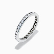 The 14K White Gold Channel Set Diamond Eternity Band, 0.50 TCW, features round diamonds in a continuous channel setting encircling the band, shown on a white background.