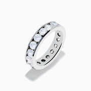 The 14K White Gold Channel Set Diamond Eternity Band, 3.00 TCW, features large round-cut diamonds evenly channel set around the ring and is shown on a plain white background.