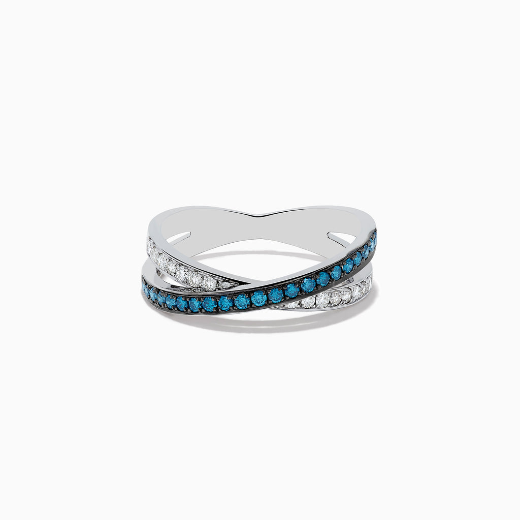 The Bella Bleu 14K White Gold Blue and White Diamond Ring, 0.57 TCW, showcases two crisscrossing bands—one with blue diamonds, the other with white—elegantly displayed against a plain white background.