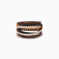 The Confetti 14K Rose Gold Black, White and Espresso Diamond Ring dazzles with a 1.36 TCW of multicolored diamonds in intertwining rows on a rose gold band.