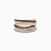 The 14K Rose Gold Brown and White Diamond Ring features alternating rows of brown and white diamonds in a stunning intertwined design, totaling 0.56 TCW, on elegant rose gold.