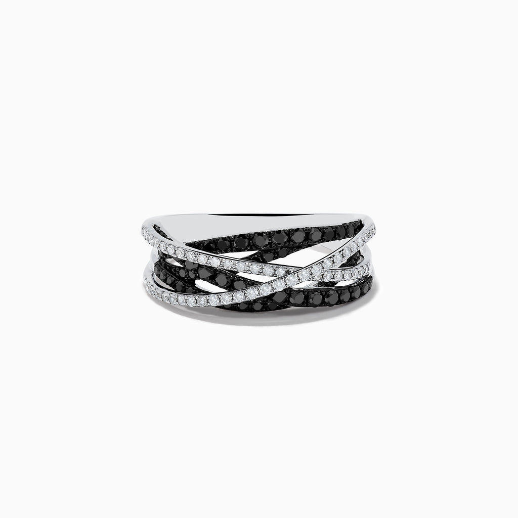 A 14K White Gold Black and White Diamond Ring (.72 TCW) with intertwined bands—one adorned with black diamonds, the other with white stones—displayed against a plain white background.