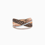The 14K Rose Gold Espresso and White Diamond Ring, 0.48 TCW, features a crisscross design with rows of sparkling espresso and white diamonds set in overlapping bands for a striking look.