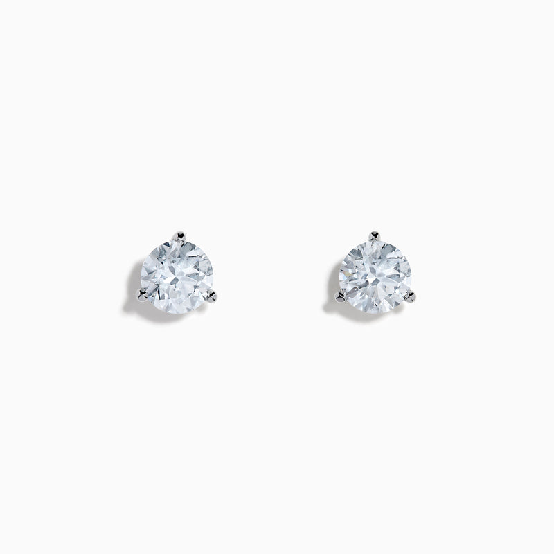 The Lab Grown Diamond Earring and Necklace Set in 14K White Gold features a heart-shaped diamond pendant on a silver necklace and matching heart-shaped diamond stud earrings, all showcased on a white background.