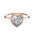 A 14K rose gold bezel full bezel east/west cathedral flat 1.5mm engagement ring displayed on a plain white background.