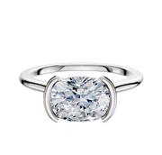 A Platinum Bezel Half Bezel East/West Cathedral Dome 1.5mm Engagement Ring with a cushion-cut diamond, set against a plain white background.