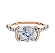 The 14K Rose Gold Bezel Half Bezel East/West Classic Dome Ring showcases a 2.5mm centerpiece with a row of pave-set diamonds along the band for timeless elegance.