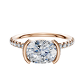 Featuring the 18K Rose Gold Bezel Half Bezel East/West Classic Dome 1-Row-Pave 2.5mm Engagement Ring, this piece showcases an oval center with pavé diamonds along the band for elegant sparkle.