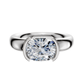 The 14K White Gold Bezel Half Bezel East/West Classic Dome 4.0mm Engagement Ring showcases a bold band and modern setting, elegantly displayed against a plain white background.