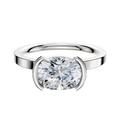 A platinum 2.0mm engagement ring in a half bezel east/west setting, featuring a classic flat band, shown against a plain white background.