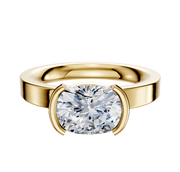 A 14K yellow gold Bezel Half Bezel East/West Classic Flat 3.0mm engagement ring with a wide band and cushion-cut diamond, shown against a plain white background.