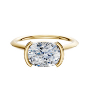 A 14K yellow gold engagement ring with a 1.5mm knife edge band in an east/west cathedral bezel and half bezel setting, displayed on a plain white background.