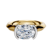 A 14K two-tone cathedral engagement ring featuring a 3.0mm half bezel, east/west cushion-cut diamond in a modern knife-edge setting, displayed against a plain white background.