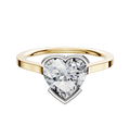 The 14K Two Tone Bezel Half Bezel East/West Cathedral Flat 1.5mm Engagement Ring is shown on a plain white background, featuring a gold band and a large heart-shaped diamond in a sleek white metal setting.