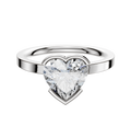 An 18K white gold East/West Classic Flat 2.0mm engagement ring featuring a bezel-set heart-shaped diamond, displayed on a simple polished band against a plain white background.