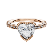 A 14K rose gold engagement ring with a classic flat design, featuring East/West bezel setting and three rows of pavé diamonds along the 2.0mm band.