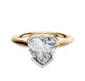 An 18K two-tone bezel half bezel east/west cathedral knife edge 2.0mm engagement ring is displayed on a plain white background.