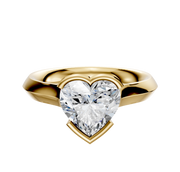 An 18K yellow gold bezel half bezel east/west cathedral knife edge 3.0mm engagement ring, showcased against a plain white background.