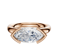 The 18K Rose Gold Bezel Half Bezel East/West Classic Dome 3.0mm Engagement Ring features a marquise diamond set horizontally in a modern bezel setting, shown against a plain white background.