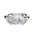 An 18K white gold bezel half bezel east/west classic dome 3.0mm engagement ring is displayed against a plain white background.