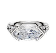 The 14K Two Tone Bezel Half Bezel East/West Cathedral Knife Edge 1-Row-Pave 2.5mm Engagement Ring features a striking design with a central diamond and a row of pave diamonds, displayed against a simple white background.
