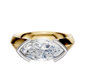 A 14K two-tone engagement ring with a 4.0mm cathedral knife edge band and an east/west half bezel setting for the center stone.