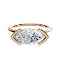 The 14K Rose Gold Bezel Half Bezel East/West Classic Knife Edge 1.5mm Engagement Ring features a large marquise-cut diamond in a unique open-frame bezel setting against a white background.
