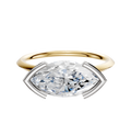 An 18K Two Tone Bezel Half Bezel East/West Classic Knife Edge 1.5mm engagement ring with a large oval diamond is displayed on a plain white background.