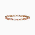 The Blush 14K Rose Gold Morganite and Diamond Tennis Bracelet showcases a single row of square-cut light pink morganite gemstones and sparkling diamonds set closely around the rose gold band.