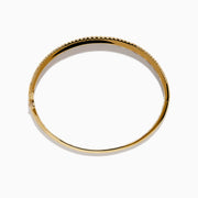 The Watercolors 14K Gold Multi Sapphire and Diamond Bangle dazzles with two diamond rows framing a central rainbow of blue, green, yellow, orange, pink, and red sapphires in a stunning gradient pattern.