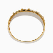 The D'oro 14K Yellow Gold Interwoven Crossover Bangle features multiple slim, interlaced bands adorned with evenly spaced round white gemstones, set in yellow gold for a radiant look.