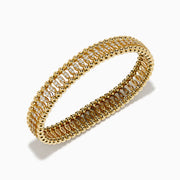 The D'Oro 14K Yellow Gold Diamond Stretch Bracelet features rounded beads and a central row of sparkling diamonds in a symmetrical, elegant design.