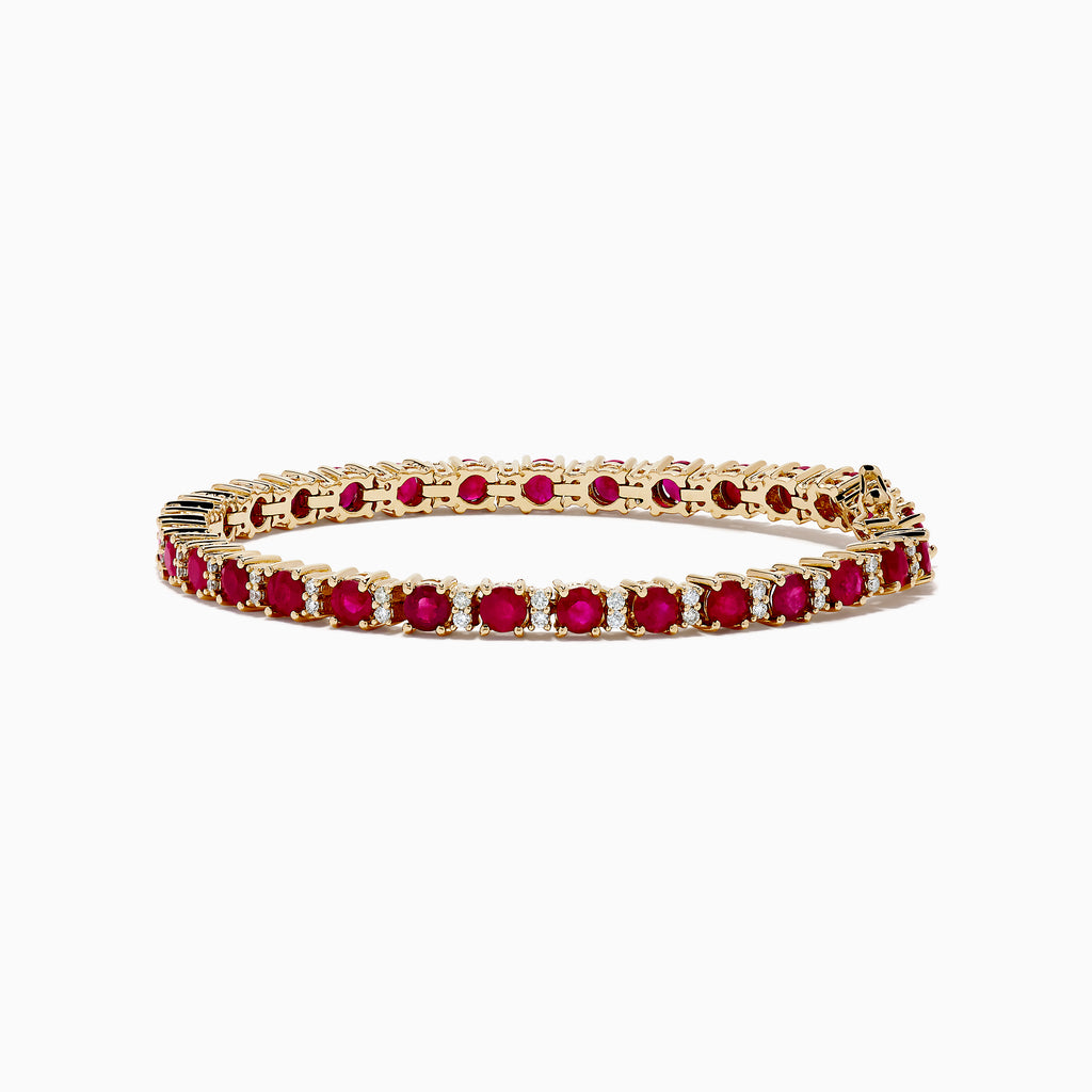 The Ruby Royale 14K Yellow Gold Ruby and Diamond Tennis Bracelet features a single row of round rubies and diamonds in prong settings, elegantly displayed against a white background.