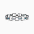 The Men's 14K White Gold Blue and White Diamond Link Bracelet features rectangular links with blue and white diamonds in geometric patterns set against a white gold background.