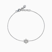 925 Sterling Silver Diamond Star of David Bracelet features a central, diamond-studded Star of David charm, adjustable clasp, and a small round tag at the end.