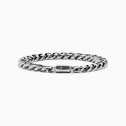 The Men's Sterling Silver Diamond Cuban Link Bracelet features a thick Cuban link chain and a rectangular clasp set with small diamonds, displayed in a circular shape on a white background.