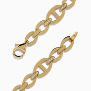 The D'Oro 14K Yellow Gold Chain Link Diamond Bracelet features interlocking oval links and embedded diamonds for a luxurious, elegant look.