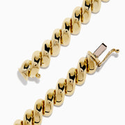 A 14K yellow gold San Marco chain bracelet, 7.5 long, features large twisted oval links and a secure clasp, displayed in a circular shape on a white background. Matching necklace available.