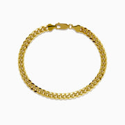Mens 14K yellow gold hollow curb chain link bracelet, 8 3/4, shown in a circular shape on a white background.