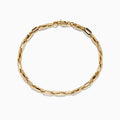 A 14K Yellow Gold Hollow Oval Link Bracelet is displayed on a plain white background, featuring elegant elongated and rectangular links.