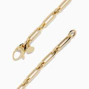 The 14K Yellow Gold Square Chain Link Bracelet features a delicate 14K yellow gold design with square links and a small round tag, shown on a white background.