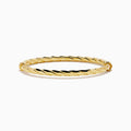 A 14K Yellow Gold Hammered Hinge Bangle featuring a textured finish, showcased on a white background.