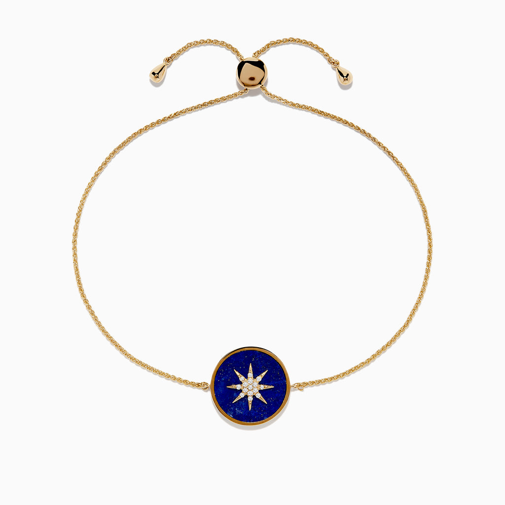 The 14K Yellow Gold Lapis and Diamond Compass Bolo Bracelet features an adjustable chain with a round lapis-inspired blue enamel center charm, adorned with a white starburst design and sparkling diamond accents.