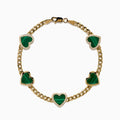 The 14K Yellow Gold Malachite and Diamond 5 Motif Heart Bracelet features five green malachite heart charms, each bordered by diamond-accented stones, evenly spaced along a yellow gold chain with a secure clasp.