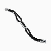 The Mens 925 Sterling Silver Black Sapphire Leather Bracelet features black braided leather, a silver clasp, and a rectangular sterling silver accent set with black stones. The design resembles a stylish black sapphire bracelet against a plain white background.