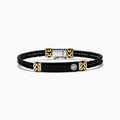 Mens 925 Sterling Silver and Leather Onyx Bracelet features black braided leather, gold and sterling silver accent clasps, a black rectangular plate, and a small round emblem on a white background.